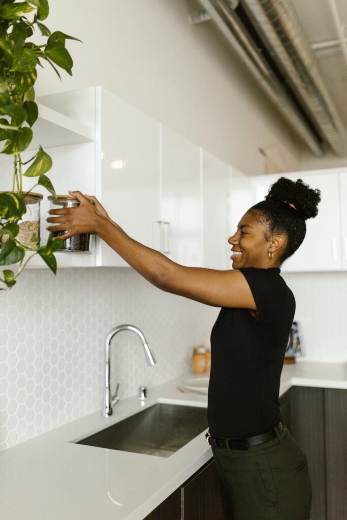 woman happy with her fake plants