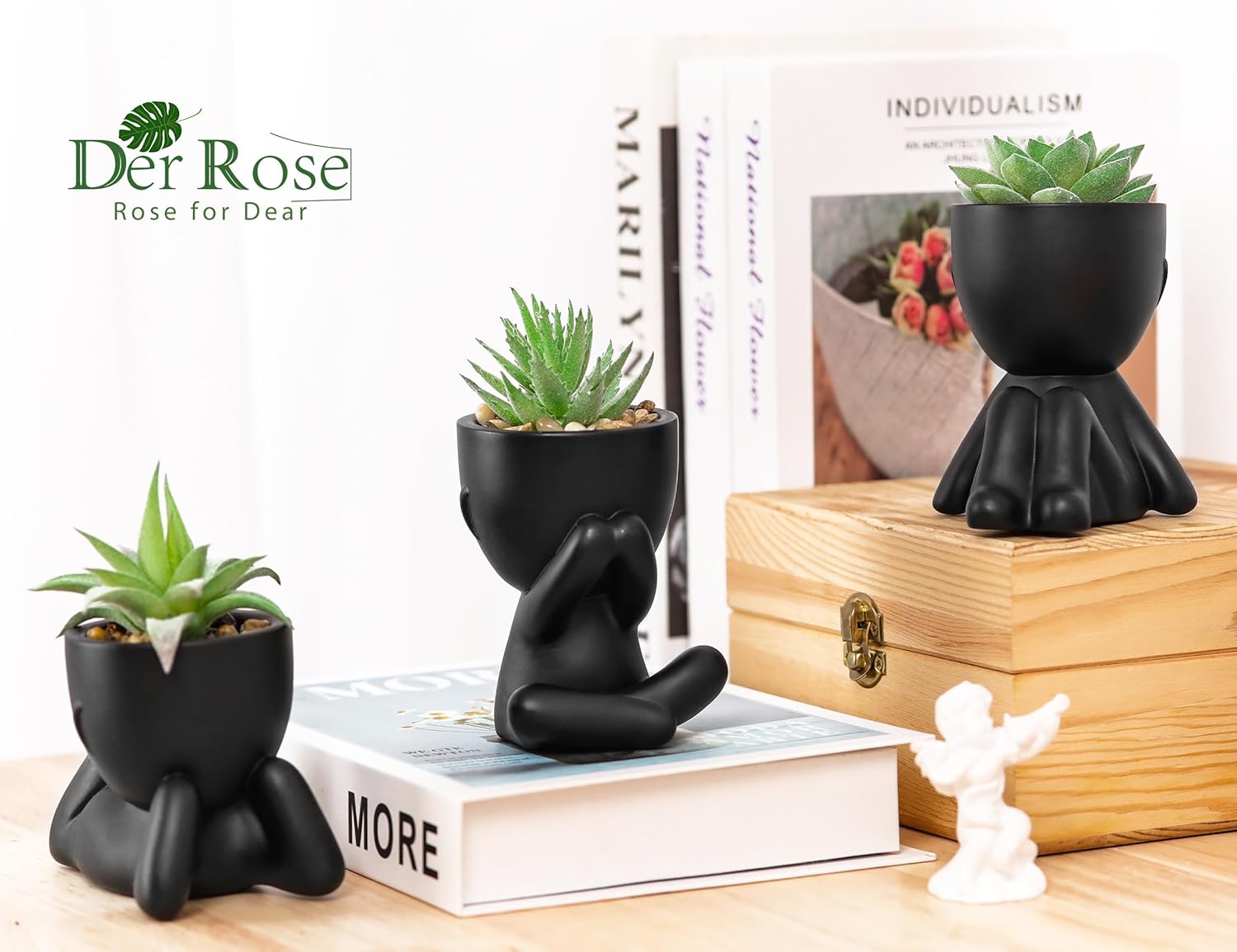 Black pot faux succulents for minimalist shelf decor