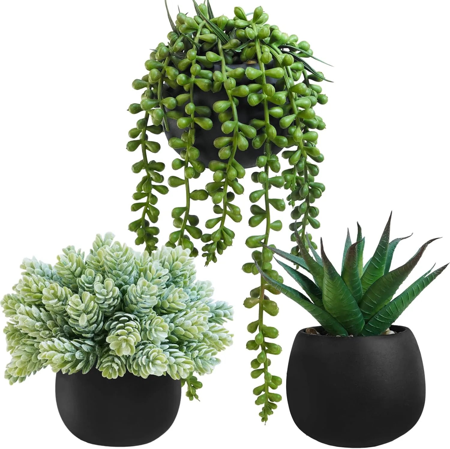 Set of three potted artificial plants in matte black planters on a light wood desk
